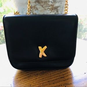 - Paloma Picasso Black Iconic X Leather Crossbody Bag